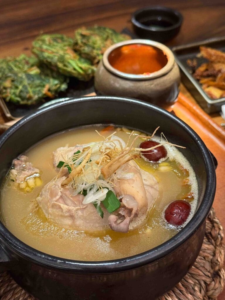 Beauty Collagen samgyetang in golden broth with ginseng and red jujube at MODU Samgyetang Singapore