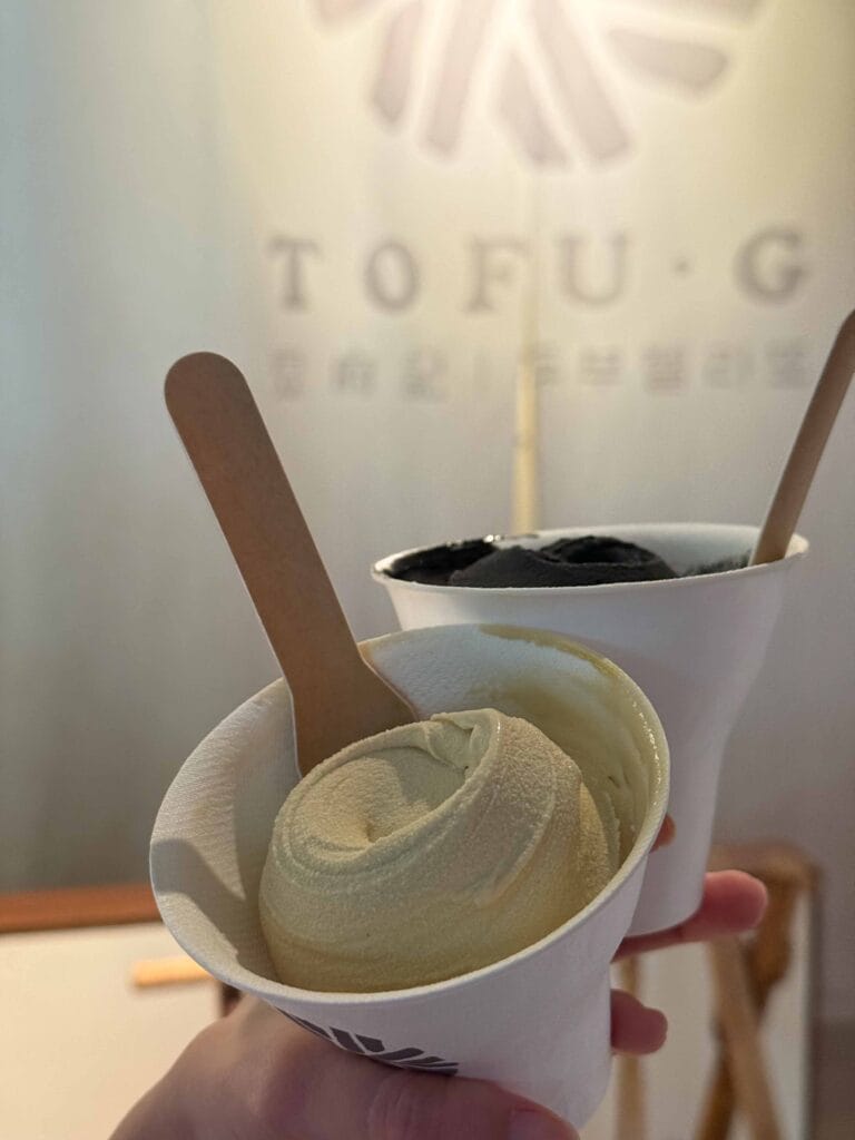 Pistachio and black sesame tofu gelato in paper cups at Tofu G Gelato Singapore