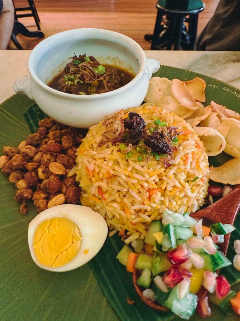 Beriani Rice 1991 Rendang Mutton served on a banana leaf with peanuts, egg and keropok at Nenek Johor Bahru
