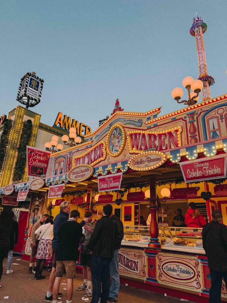 Zuckerwaren sweet stall selling chocolate covered fruit at the Oktoberfest funfair in Munich