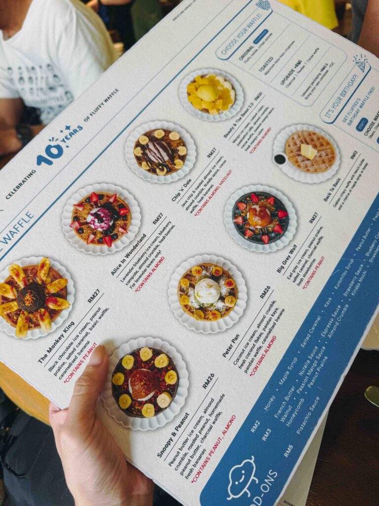Fluffed Cafe waffle menu showing Beauty and the Beast, Chip n Dale, and Alice in Wonderland waffles