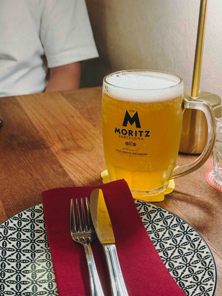 Pint of Moritz Pilsner draft beer on table at My Little Spanish Place Singapore