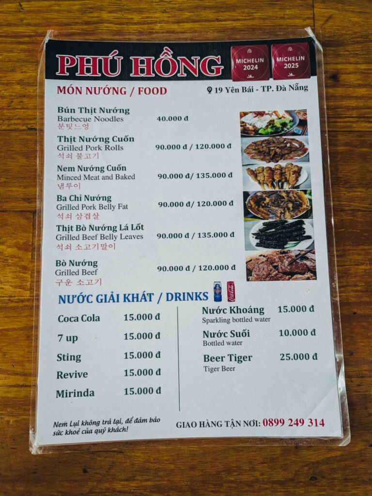 Quán Phú Hồng restaurant menu showing grilled meat dishes and prices in Da Nang