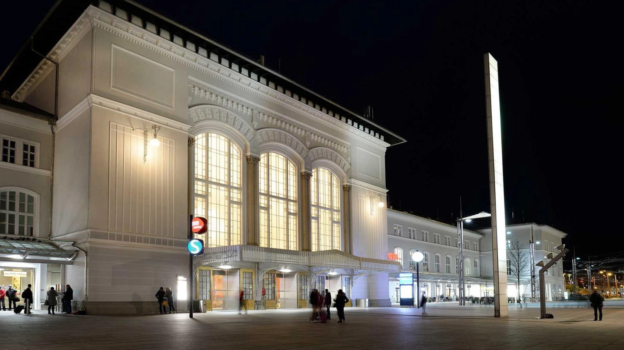 Salzburg Hauptbahnhof train station illuminated at night